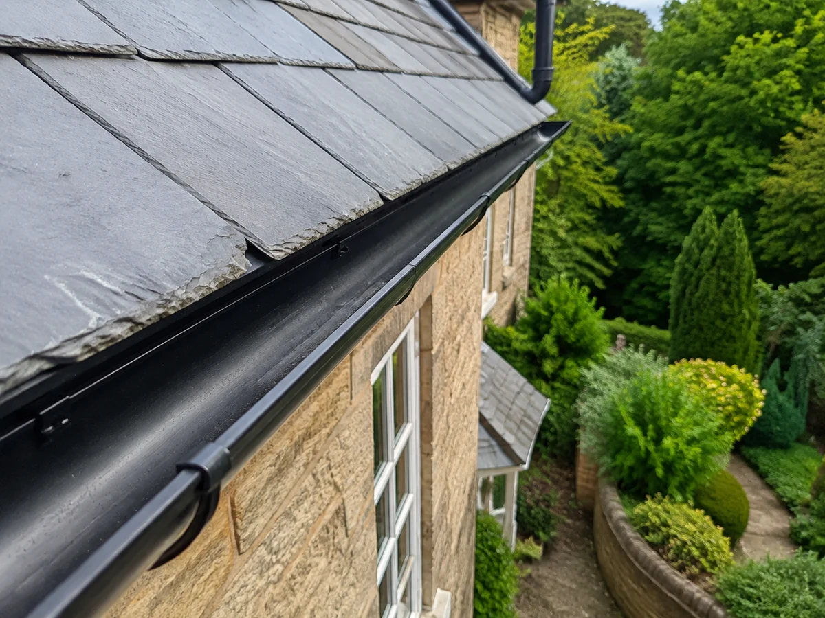 Illustration of gutter clearing on a Yorkshire home